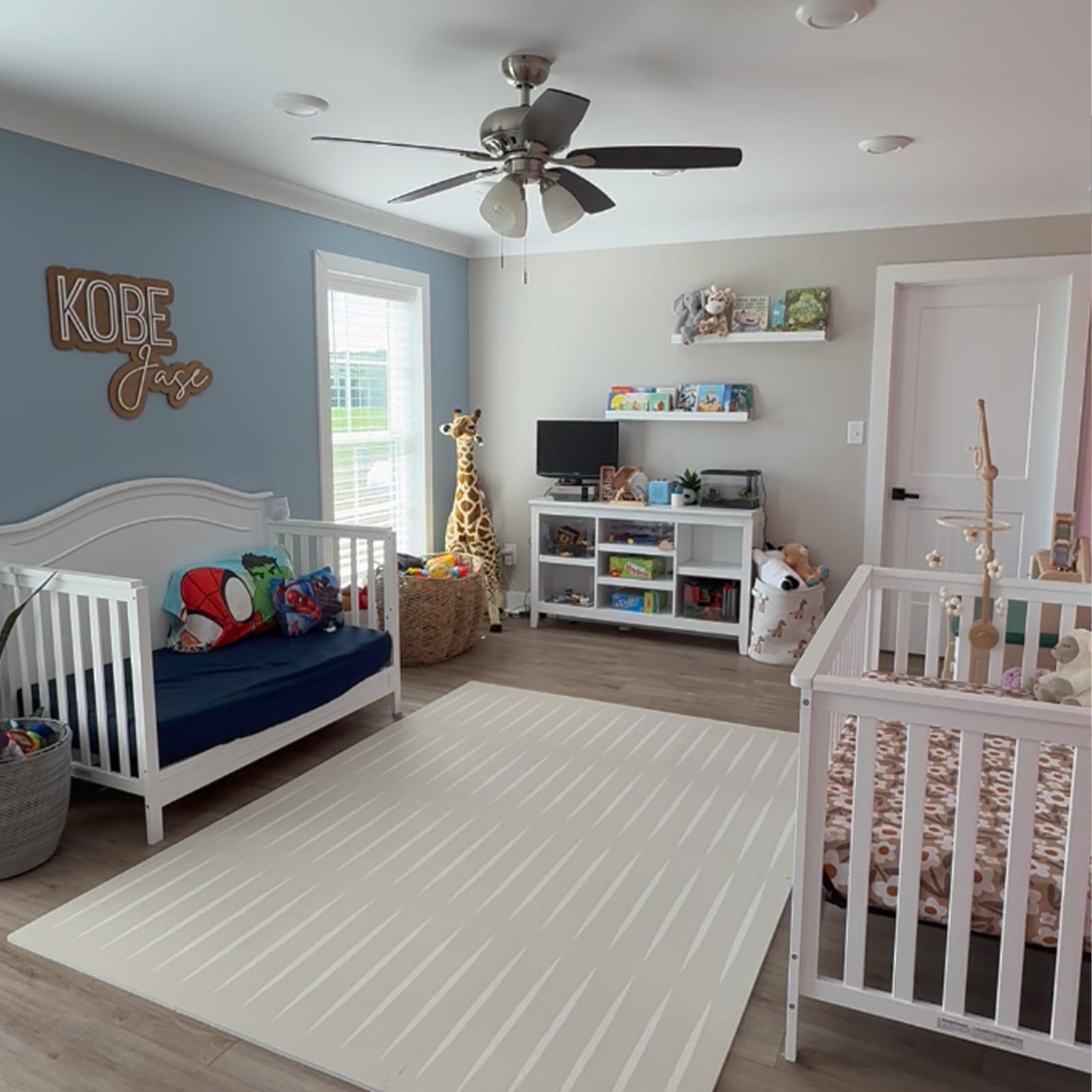 Eeveve play mat in a child’s room creating a safe play area.