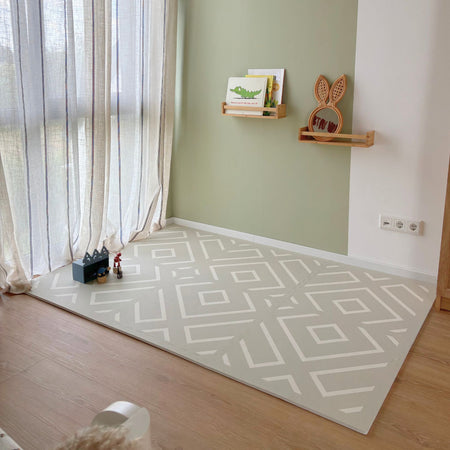 Eeveve Play Mat Modern Blocks Soft Sage laid out in a modern nursery, blending seamlessly with decor while providing a safe play area for toddlers.