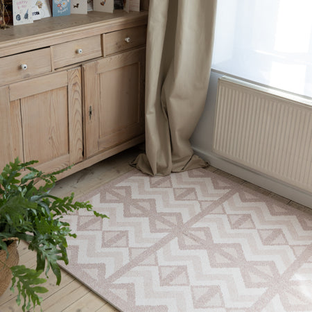 Eeveve Kilim Soft Clay play mat in a sunlit room with wooden furniture. Stylish and safe EVA foam mat for baby and toddler spaces.